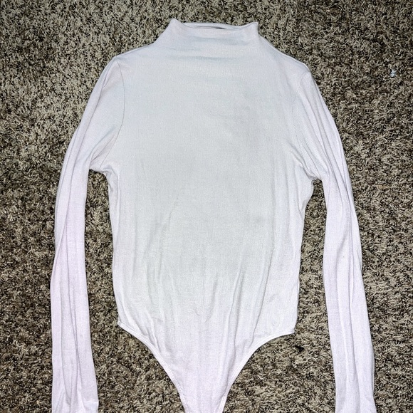 Shinestar Sweaters - Shinestar light purple bodysuit with mock neck.